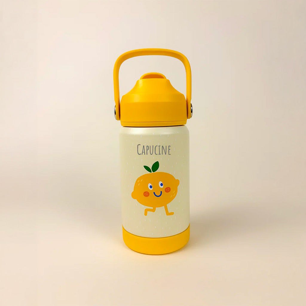 Gourde crème à anse et base jaunes, décorée d’un citron souriant et personnalisée au prénom Capucine